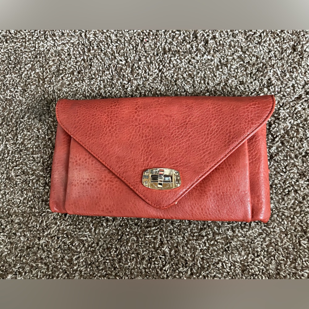 Orange clutch with strap